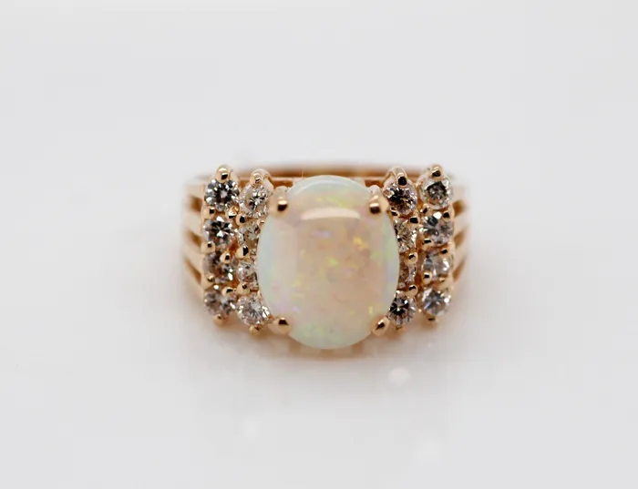 FULLERS PURCHASE FROM PUBLIC Rings ESTATE 14KY 215 CT OPAL AND DIAMOND RING 60 CTTW IJSI2 FULLERS PURCHASE FROM PUBLIC Rings ESTATE 14KY 215 CT OPAL AND DIAMOND RING 60 CTTW IJSI2